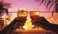 Two hands toasting refreshing cold drinks, Cheers! Closeup of hands toasting with glass