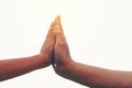 Two hands together, Close up of mother or older sister and a chi Royalty Free Stock Photo