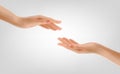 Two hands touching People helping each other with their fingertips. Giving a helping hand concept. Concept of human relation, Royalty Free Stock Photo