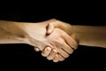 Two hands unite with eachother as agreement