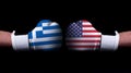 Two hands of wearing boxing gloves with USA and Greece flag. Boxing competition concept. Confrontation between two countries