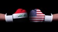 Two hands of wearing boxing gloves with USA and Iraq flag. Boxing competition concept. Confrontation between two countries