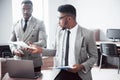 Two handsome cheerful african american executive business man at the workspace office Royalty Free Stock Photo