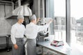 Confectioners working at the bakery manufacturing