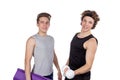 Two handsome guys doing fitness workout with weights isolated on white background Royalty Free Stock Photo