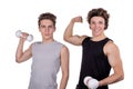 Two handsome guys doing fitness workout with weights isolated on white background Royalty Free Stock Photo