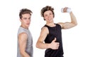 Two handsome guys doing fitness workout with weights isolated on white background Royalty Free Stock Photo