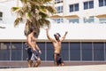 Two handsome Israeli men walking along the beach promanade of Te Royalty Free Stock Photo