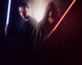 Two handsome warrior holding a light saber Royalty Free Stock Photo