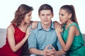 Two Handsome Women Flirting Man Love Triangle. Royalty Free Stock Photo