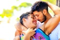 two handsome young man kissing in park and feeling happy Royalty Free Stock Photo