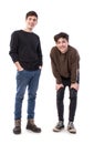 Two handsome young men posing on a white background Royalty Free Stock Photo