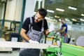 Two handsome young men working in furniture factory Royalty Free Stock Photo