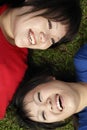 Two happy asian teen girls laughing Royalty Free Stock Photo