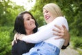 Two happy beautiful girls having fun outdoor Royalty Free Stock Photo