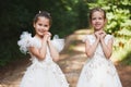 Happy beautiful girls with white wedding dresses