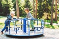 Two happy boys playing on playground in a park. Royalty Free Stock Photo