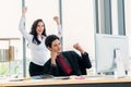 Two happy business people celebrate at office Royalty Free Stock Photo