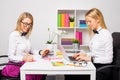 Two happy business women working in team Royalty Free Stock Photo