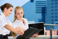 Two happy businesswomen with documents Royalty Free Stock Photo