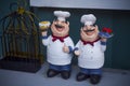 Two chef dolls standing together Royalty Free Stock Photo