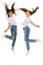 Two happy children jumping at once on a white background Royalty Free Stock Photo