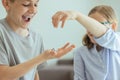 Two happy children playing with dices and laughing Royalty Free Stock Photo