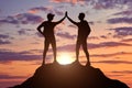 Two happy climbers on top of a mountain Royalty Free Stock Photo