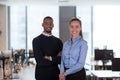 Two happy diverse professional executive business team people woman and African American man looking at camera standing Royalty Free Stock Photo