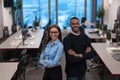 Two happy diverse professional executive business team people woman and African American man looking at camera standing Royalty Free Stock Photo