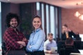Two happy diverse professional executive business team people woman and man looking at camera standing in office lobby Royalty Free Stock Photo