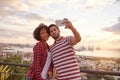 Two happy friends taking a selfie