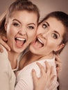 Two happy friends women hugging Royalty Free Stock Photo