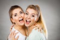 Two happy friends women hugging Royalty Free Stock Photo