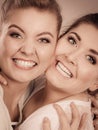 Two happy friends women hugging Royalty Free Stock Photo