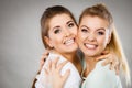 Two happy friends women hugging Royalty Free Stock Photo