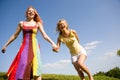 Two happy girls jumping Royalty Free Stock Photo