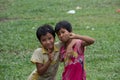 Two happy girls fooling around in Mrauk U, Myanmar