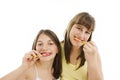 Two happy girls with toothbrush Royalty Free Stock Photo