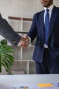 Two happy and happy professional business leaders shaking hands at office Smiling businessman greets partner Royalty Free Stock Photo