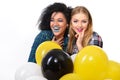 Two happy hipster girls in sunglasses have fun with balloons Royalty Free Stock Photo