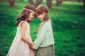 Two happy kid girl playing together in summer, outdoor activities Royalty Free Stock Photo