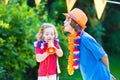 Two happy kids Dutch football supporters Royalty Free Stock Photo