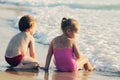 Two happy kids playing on the beach Royalty Free Stock Photo