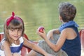 Two happy kids playing on the boat at summer day Royalty Free Stock Photo