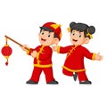 Two happy kids are playing and one of them holding the chinese paper lantern Royalty Free Stock Photo