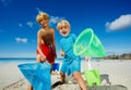 Two happy kids stand with butterfly nets catching critter Royalty Free Stock Photo