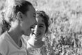 Two Happy little girls laughing and hugging at the summer park. Royalty Free Stock Photo