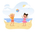 Two happy little girls are playing with ball at the beach Royalty Free Stock Photo