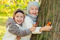 Two happy little kids playing in the park Royalty Free Stock Photo